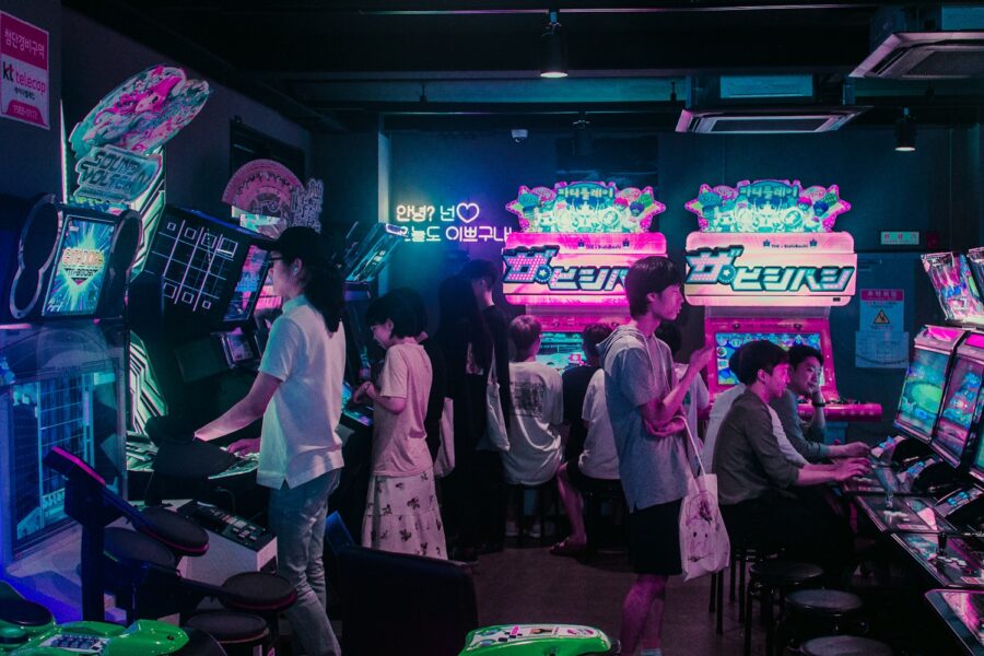 Fighting game tournament crowd arcade sticks stage