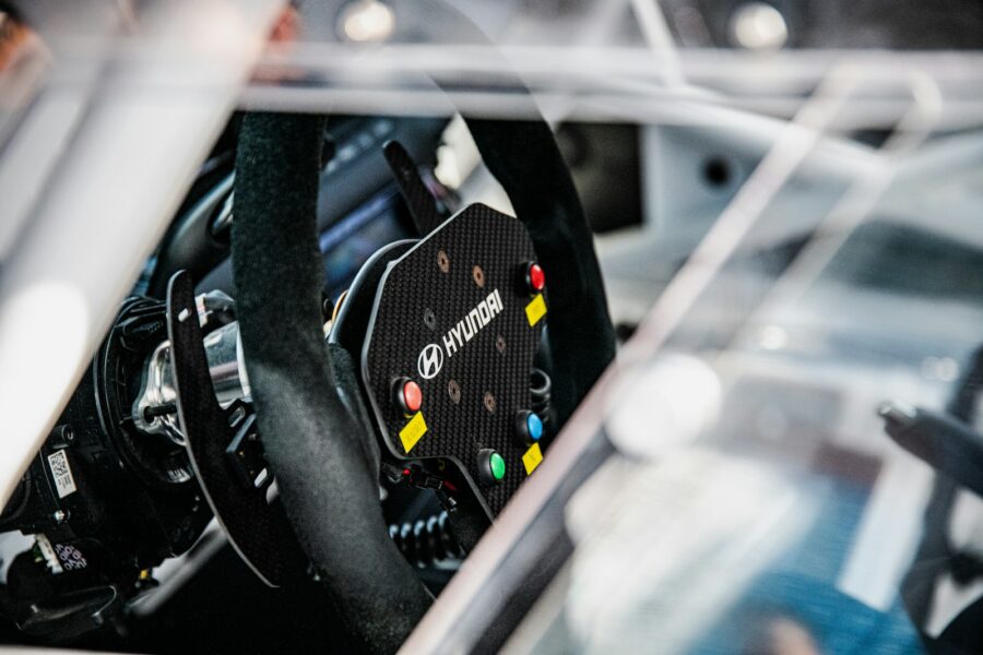Racing simulator cockpit steering wheel monitor