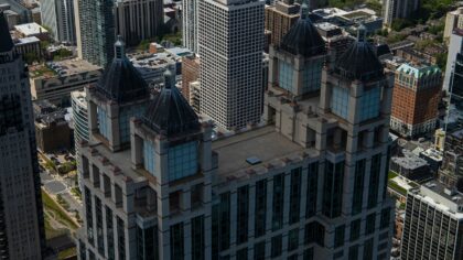 Managing city budgets in building simulators without stalling growth