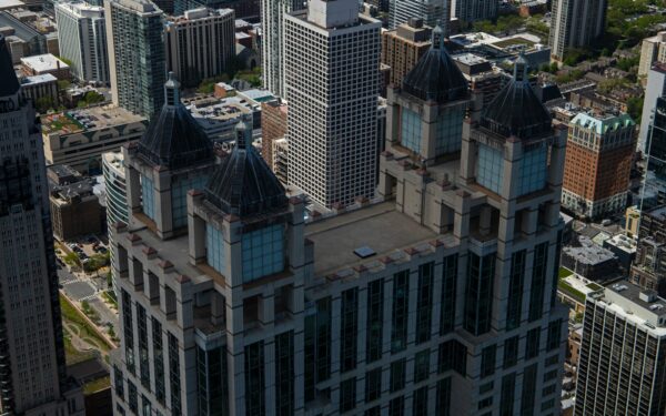 Managing city budgets in building simulators without stalling growth