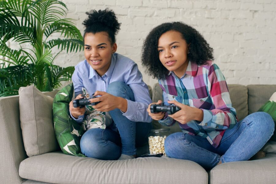 Teenager console controller couch television