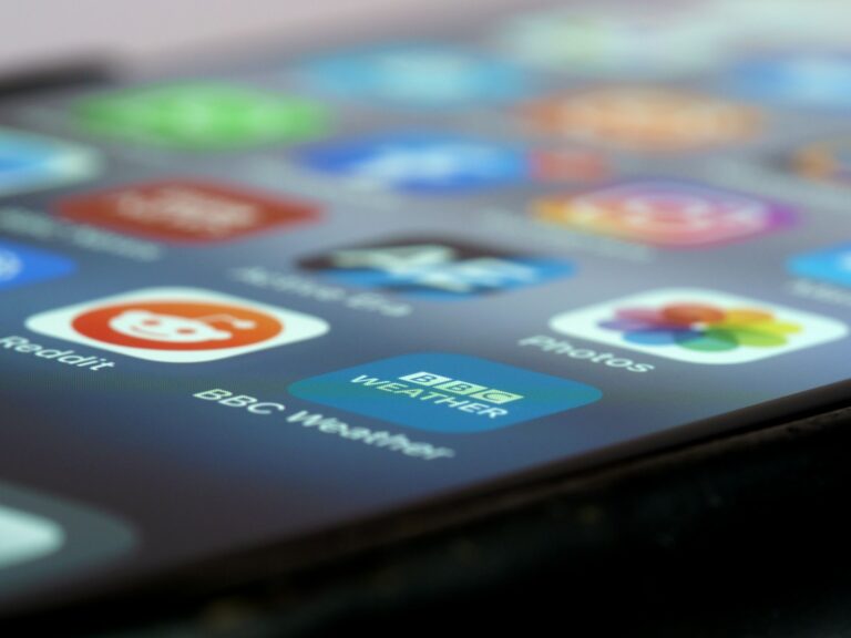 Closeup phone screen app store reviews