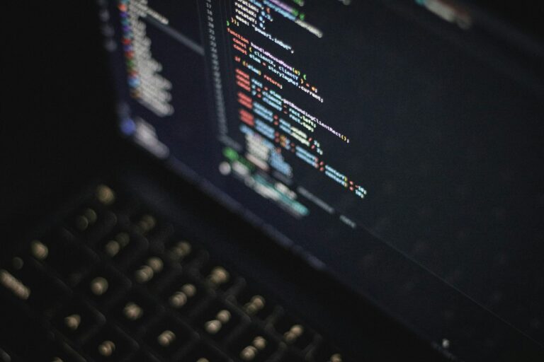 Close keyboard hands computer screen code