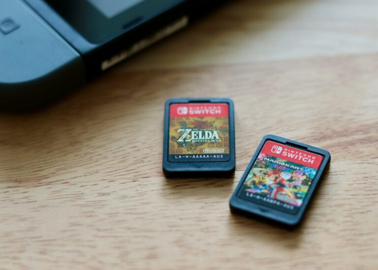 Nintendo controller closeup retro game cartridges desk
